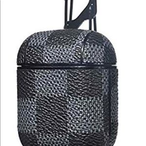 Air Pod checkerboard leather case and carbiner.